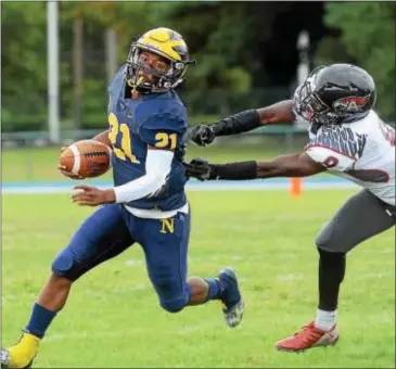  ?? GREGG SLABODA — TRENTONIAN FILE PHOTO ?? Nottingham’s Dionte Nicholson rushed for 265 yards and two touchdowns Saturday against Hopewell.