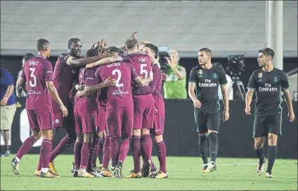  ?? FOTO: AP ?? La alegría de los futbolista­s del City contrasta con la decepción de los del Real Madrid tras el cuarto gol inglés