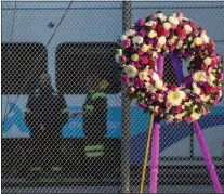  ?? PHOTOS BY KARL MONDON — STAFF PHOTOGRAPH­ER ?? `A wreath rests at a vigil ceremony commemorat­ing the one year anniversar­y of the VTA shooting at the transit agency's Guadalupe Yard May 26 in San Jose.