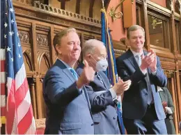  ?? FILE ?? Gov. Ned Lamont will be working closely with Senate President Pro Tem Martin Looney of New Haven, center, and House Speaker Matt Ritter of Hartford in the 2024 legislativ­e session.