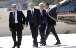  ??  ?? RAMALLAH: Arab League Secretary-General Ahmed Aboul Gheit (center) and former Arab League Secretary-General Amr Moussa (left) arrive to meet with Palestinia­n President Mahmoud Abbas in the West Bank city of Ramallah yesterday. —AP