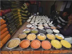  ??  ?? Pulses are kept on display for sale inside a shop at a wholesale market in Guwahati. Pulses imports to India, the world’s biggest buyer, may fall to their lowest in nearly two decades after the government raised import taxes and restricted overseas...