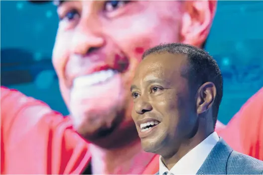  ?? GERALD HERBERT / AP ?? Tiger Woods speaks during his induction into the World Golf Hall of Fame on Wednesday in Ponte Vedra Beach, Fla.