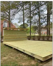  ?? SUBMIITTED ?? This wooden platform is the base for the Dr. Mark Schram Memorial Outdoor Classroom at Lyon College in Batesville. Built-in bench seating will be added to the sides of the structure, as well as a surroundin­g poetry garden. Schram was a biology professor at Lyon for many years and a colleague of Robert Gregerson, whose gift helped make the outdoor classroom possible.