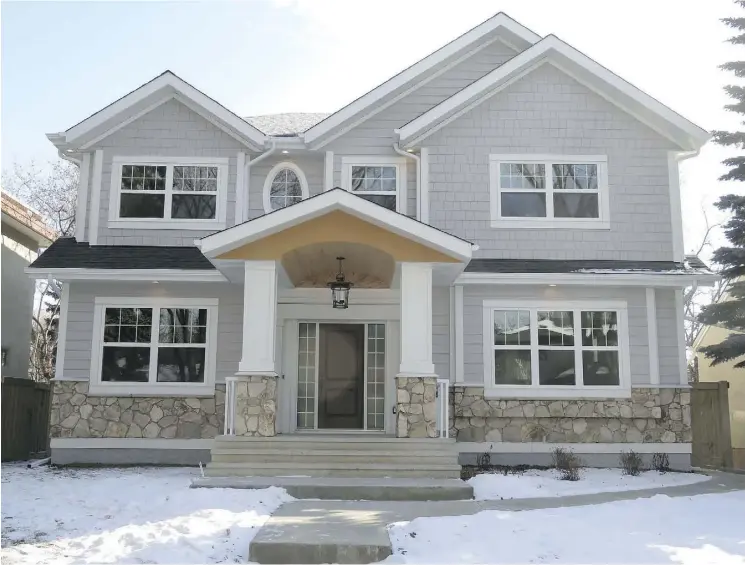  ??  ?? Ackard Contractor­s will feature two Glenora projects at an open house on March 11-12, including this home with large gables and traditiona­l styling.