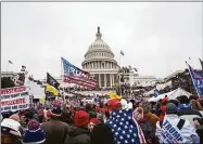  ?? Jose Luis Magana / Associated Press ?? Rioters loyal to President Donald Trump rally at the U.S. Capitol in Washington on Jan. 6, 2021.