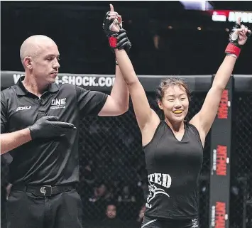  ?? — THE CANADIAN PRESS FILES ?? Vancouver-born MMA fighter Angela Lee, who now lives and trains in Hawaii, will put her One Championsh­ip atomweight title on the line Friday in Singapore against unbeaten Brazilian kickboxer Istela Nunes.