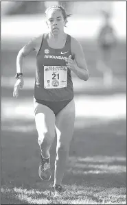  ?? NWA Democrat-Gazette/ANDY SHUPE ?? Arkansas freshman Aston Endsley nears the finish line to take fourth place in the women’s collegiate race Saturday in Fayettevil­le.