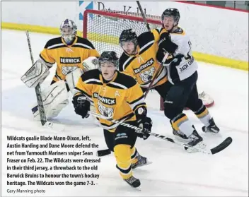  ?? Gary Manning photo
– ?? Wildcats goalie Blade Mann-Dixon, left, Austin Harding and Dane Moore defend the net from Yarmouth Mariners sniper Sean Fraser on Feb. 22. The Wildcats were dressed in their third jersey, a throwback to the old Berwick Bruins to honour the town’s hockey heritage. The Wildcats won the game 7-3.