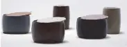  ??  ?? Bang this drum: Drum ottoman and side tables