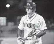  ?? AP/SEAN RAYFORD ?? Tim Tebow, shown with the Columbia (S.C.) Fireflies in April, was called up earlier this week to the St. Lucie (Fla.) Mets, the New York Mets’ advanced Class A minor-league affiliate. Tebow, the 2007 Heisman Trophy winner while at the University of...