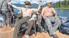  ?? FOTO: AFP ?? Wladimir Putin (li.) und Minister Sergej Schoigu in Sibirien.