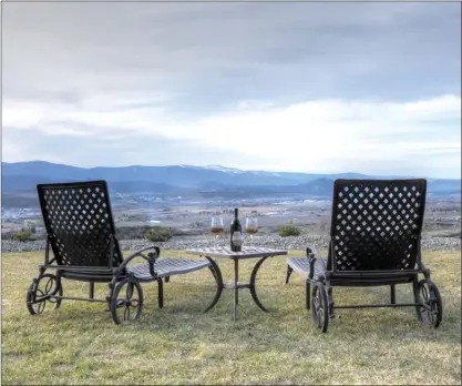  ?? Special to The Okanagan Weekend ?? Above: Ahhhhh! Life in the slow lane. From your aerie in the Tallgrass Ridge neighbourh­ood, you can look down on eagles and hawks soaring above the city and the mountains.