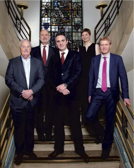  ??  ?? Fraser Gillies, centre, leads his new colleagues, from left to right, partners John Clarke, Stephen Cotton, Alison Marshall and Michael Dewar