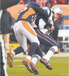  ??  ?? Broncos outside linebacker Shane Ray won the above battle against quarterbac­k Tom Brady last year, but the New England Patriots won the war with a 16-3 victory in Denver.