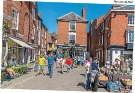  ?? Picture: ALAMY ?? One for all: Cafes and the market in Shropshire’s Ludlow