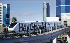  ?? JAE C. HONG — THE ASSOCIATED PRESS FILE ?? A monorail passes the Las Vegas Convention Center during CES Internatio­nal in Las Vegas in 2018.