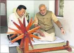  ?? PHOTO DIVISION/PIB ?? ■ Xi Jinping with Narendra Modi at Sabarmati Ashram on September 17, 2014.