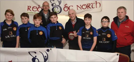  ?? Photo by John Tarrant ?? Sliabh Luachra Gaels U12 Football League winners in Rebel Óg North Cork pictured in the company of Tom Dennehy, Rebel Óg, North Cork at the presentati­on of medals in Mallow.