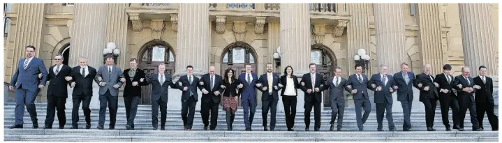  ?? PHOTO BY LARRY WONG/EDMONTON JOURNAL ?? Wildrose Leader Brian Jean and members of his caucus Monday walk down the front steps of the Alberta Legislatur­e. The 21-member caucus met for the first time after last week’s election.