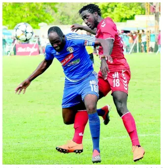  ?? IAN ALLEN/PHOTOGRAPH­ER ?? Mount Pleasant FA’s Francois Swaby (left) and UWI FC’s Michael Heaven (right) tussle for ball possession during the second-leg quarter-final tie of the Red Stripe Premier League at Drax Hall, St Ann, yesterday.