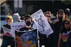  ?? Photograph: David McNew/Getty Images ?? Pro-LGBTQ+ demonstrat­ors rally after fights outside a Los Angeles elementary school last year.