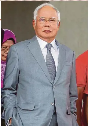  ?? PIC BY HAFIZ SOHAIMI ?? Datuk Seri Najib Razak at the Kuala Lumpur Courts Complex for the mention of his case involving RM2.28 billion of 1Malaysia Developmen­t Bhd funds yesterday.