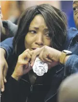  ??  ?? MOURNING. A family member of Karabo Mokoena attends the funeral service.