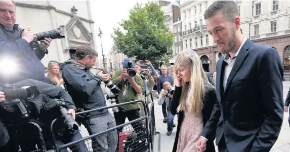  ?? Jonathan Brady ?? > Charlie Gard’s parents Chris Gard and Connie Yates arrive at the Royal Courts of Justice in London yesterday