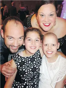  ??  ?? Geoff and Bridgette Ady and daughters Isabella and Olivia, the latter an osteosarco­ma patient, attended Ronald McDonald House’s A Night To Dream gala.