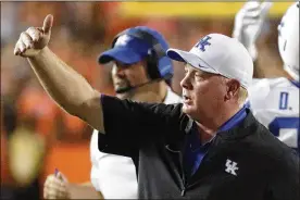  ?? JOHN RAOUX / ASSOCIATED PRESS ?? Kentucky coach Mark Stoops (above) beat then-No. 25 Florida on the road earlier this month. Florida coach Dan Mullen says the real difference in the SEC is the quality of competitio­n from its unranked teams.