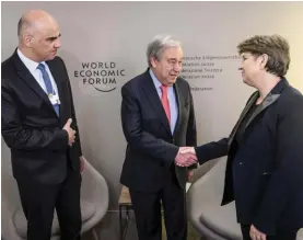  ?? ?? Alain Berset, left, President of the Switzerlan­d poses with United Nations Secretary-General Antonio Guterres, center, and Viola Amherd, right, Minister of Defence of Switzerlan­d. Photo: Laurent Gillieron/Keystone via AP.