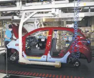  ??  ?? A worker at the joint factory of Kibar Holding and Hyundai in northweste­rn Turkey’s Kocaeli province, Aug. 28, 2020.