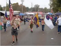  ??  ?? Members of Pack 311 of the Atlanta and Queen City, Texas, area were impressive in leading Bloomburg’s Cullen Baker Festival Parade.
