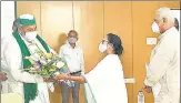  ?? HT PHOTO ?? BKU leader Rakesh Tikait meets Bengal CM Mamata Banerjee and TMC leader Yashwant Sinha in Howrah on Wednesday