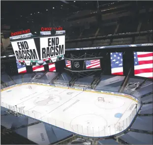  ?? Tribune News Service ?? “End Racism” is displayed on the scoreboard in light of the recent events in Kenosha, Wisconsin, in regards to the shooting of Jacob Blake, prior to game three of the Western Conference Second Round.