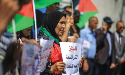  ??  ?? A protest in Gaza against Israel’s plans to annex the West Bank. ‘The lawyer Michael Sfard predicts the large-scale expropriat­ion of Palestinia­n land and property, and expulsions.’ Photograph: Anadolu Agency/Getty Images