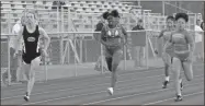  ?? Barbara hall ?? A Sonoravill­e runner, left, sprints to the finish line in front of a Gordon Central freshman Raniyah Ellis and two girls from Northwest Whitfield.