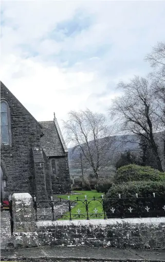  ?? PHOTO: CLODAGH KILCOYNE/ REUTERS ?? Lonely farewell: Funeral director Jasper Murphy, of McCarthy’s Bar and Undertaker­s, directs mourners carrying the coffin of a local man in the empty grounds of Fethard parish church, in Co Tipperary, earlier this month.