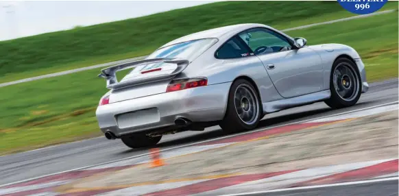  ??  ?? This 996 is pretty sprightly on the track, helped in no small part by the new 3.7-litre motor from Autofarm. Well, the original 3.4-litre had done 300,000-miles