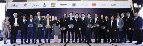  ??  ?? TOP 10 ARCHITECTS (From left) BCI Asia Philippine­s CMD manager Apple Patricio, Aidea Inc. SVP Ar. Caryl Silva, Arch HAus Asia Consultant­s, Inc. chairman and founder Frederick Asinas and president Ar. Marlo Jesus Asinas, ASYA principal architect Ar....