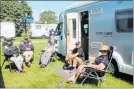  ??  ?? Visitors from Hawke’s Bay and Manawatu enjoy the sun and company.