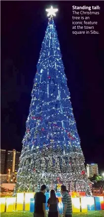  ??  ?? Standing tall: The Christmas tree is an iconic feature at the town square in Sibu.