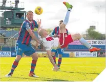  ??  ?? Killie’s Conor Sammon in action.