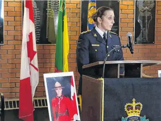  ?? POSTMEDIA NEWS ?? RCMP Asst. Commission­er Rhonda Blackmore answers questions regarding Const. Shelby Patton, who was killed while on duty early Saturday morning, during a press conference at RCMP ‘F’ Division headquarte­rs in Regina, Sask., Saturday. Beside her is a photo of Const. Patton.