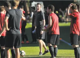  ?? Lea Suzuki / The Chronicle ?? Jeremy Gunn (center) has Stanford closing in on a fourth consecutiv­e Pac-12 title. “He makes sure we do the little things right,” Cardinal midfielder Drew Skundrich said.