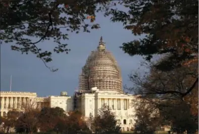  ?? ALEX BRANDON — THE ASSOCIATED PRESS FILE ?? In this file photo, The Capitol dome is seen on Capitol Hill. It’s been like a long-delayed New Year’s resolution for the GOP. But 2016 will finally be the year congressio­nal Republican­s put legislatio­n on President Barack Obama’s desk repealing...