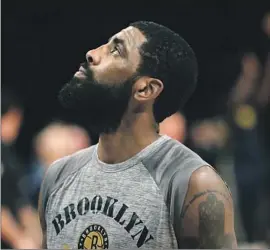  ?? Noah K. Murray Associated Press ?? IN 2022, Brooklyn Nets star Kyrie Irving posted a link on social media to a movie rife with antisemiti­sm, and initially refused to apologize for it.