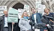  ??  ?? Rebecca Steinfeld and Charles Keidan, far left, and addressing the media outside the High Court in London last Tuesday, left