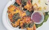  ?? Los Angeles Times ?? Stephanie Breijo ANAJAK THAI: Southern Thai-style fried chicken topped with mounds of kaluga caviar.